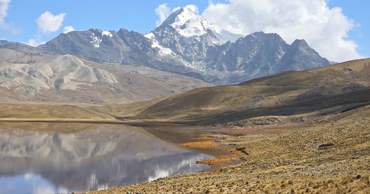 Snow-covered ridge at Huayna Potosí in Bolivia during sunrise