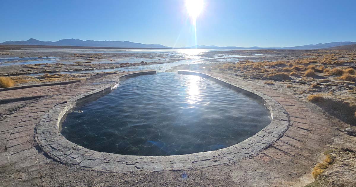 The natural hot spring near the geysers, a perfect spot to relax.