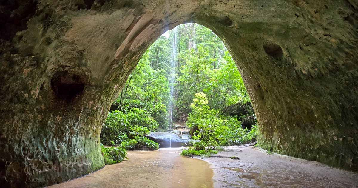 The stunning Gruta da Judeia, a hidden gem in the Amazon rainforest, featuring a serene waterfall and natural cave formations