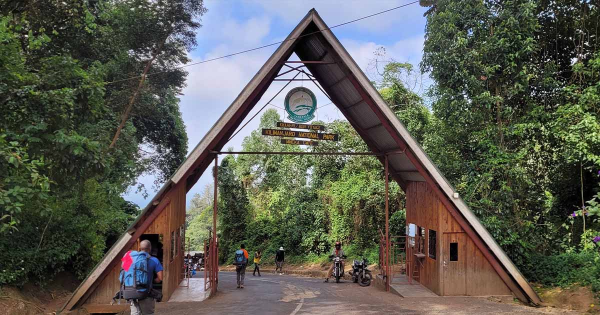 The entrance gate to the Mweka Trail of Kilimanjaro National Park, signaling the end of the trek