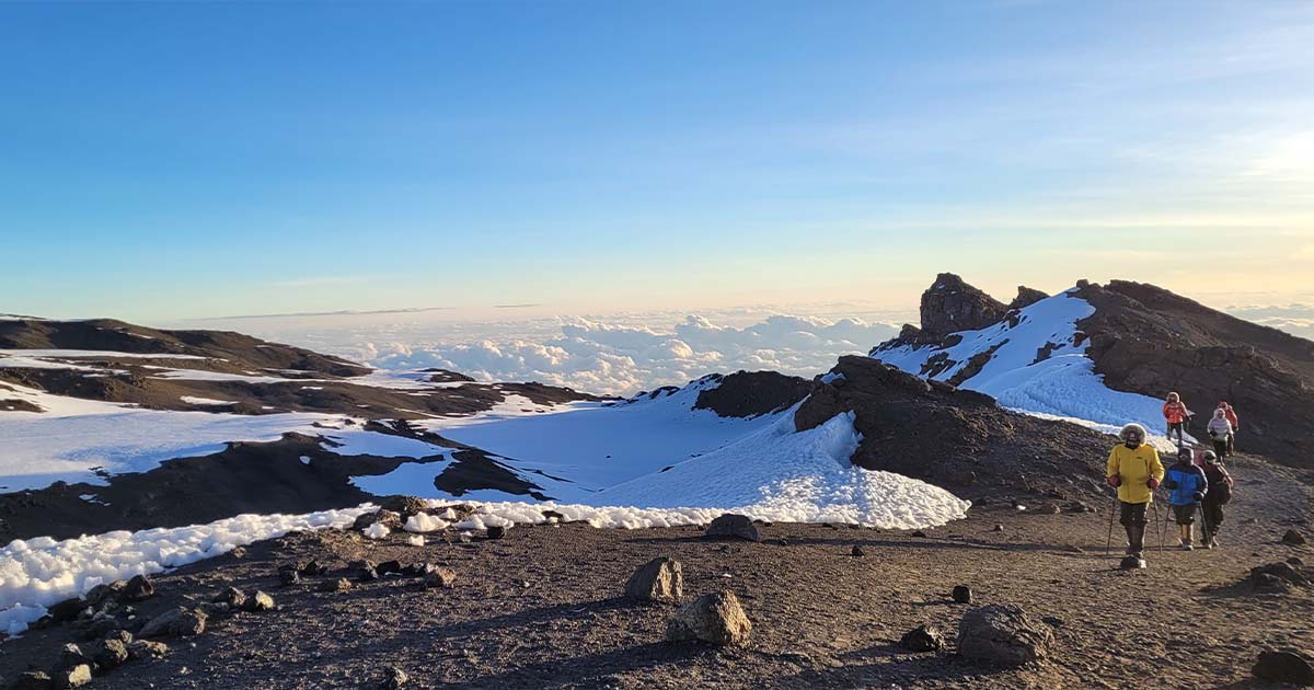 Hikers attempting the summit after sunrise